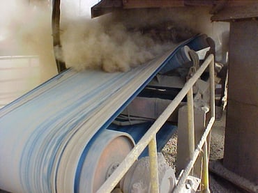 Dust Rolling Out of Conveyor
